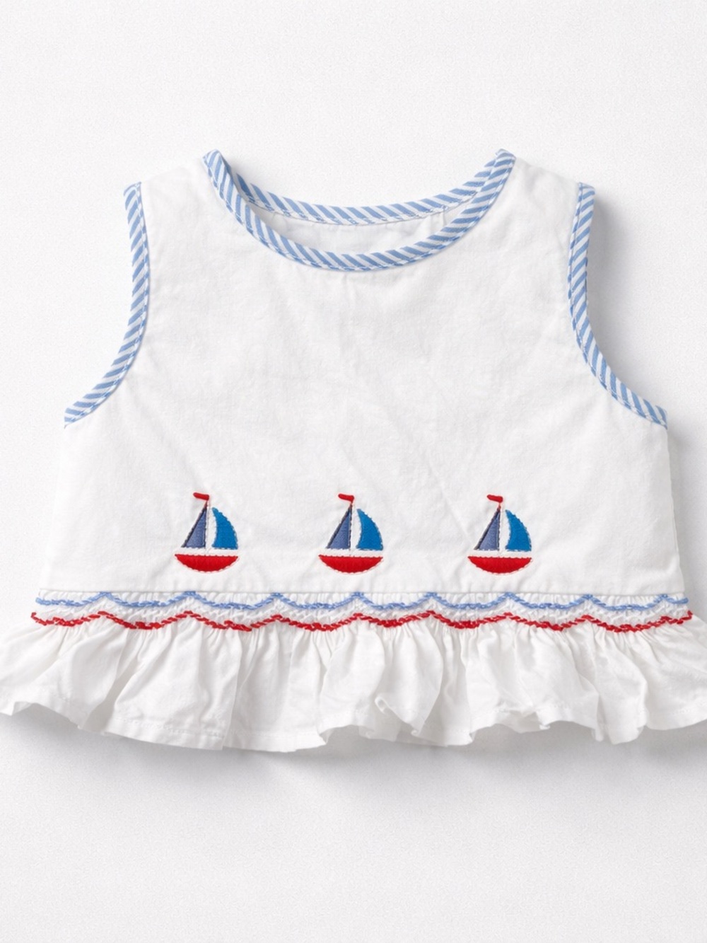 Les Petit s Soleils white smocked sailboat embroidered top red white blue 18 m